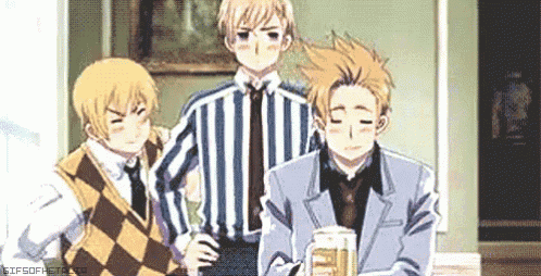 three anime characters are standing next to each other in a room and one of them is holding a mug of beer .