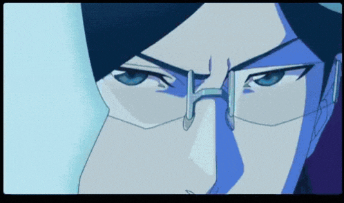 a close up of a person 's face with glasses