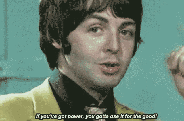 a man in a yellow suit is saying if you 've got power you gotta use it for the good