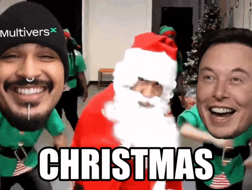 a man wearing a hat that says multivers is standing next to a man dressed as santa claus