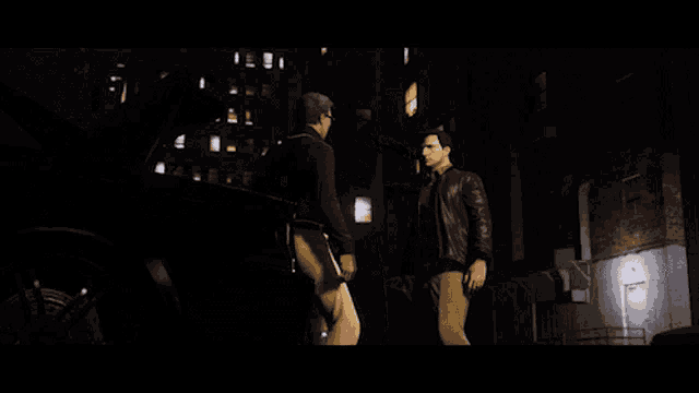 two men hugging in front of a car in a dark alleyway