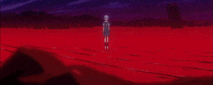 a girl in a blue dress is standing on a red surface .