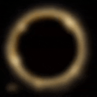 a black background with a gold circle in the middle and the word to on it .