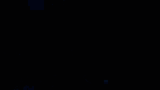 two men are playing music in a dark room with the letter k on the bottom