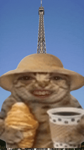 a cat in a hat is holding a cup of coffee and a croissant in front of the eiffel tower