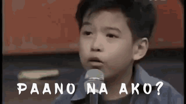 a young boy stands in front of a microphone with the words paano na ako written below him