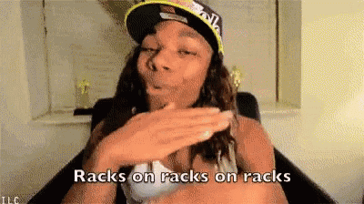 a woman wearing a hat says racks on racks on racks in sign language