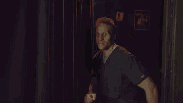a blurry picture of a person standing in a room