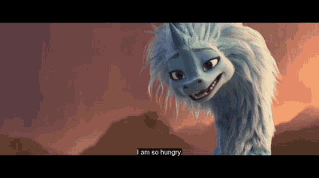 a cartoon character says i am so hungry in front of mountains