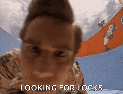 a close up of a person 's face with the words " looking for locks " on the bottom