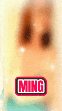 a close up of a person 's face with the word ming in the corner