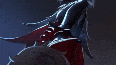 a close up of a person 's torso with a red and black dress
