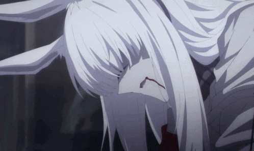 a close up of a person 's face with white hair