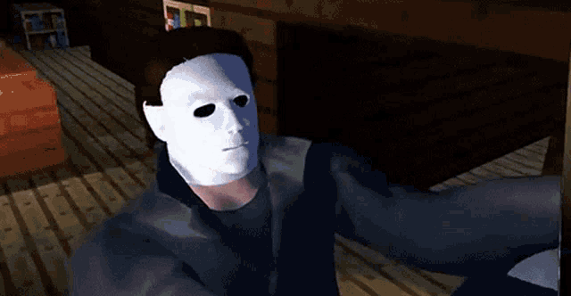 a man in a white mask is standing next to another man in a room .