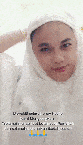 a woman wearing a white head scarf with the words mewakili seluruh crew keche kami mengucapkan