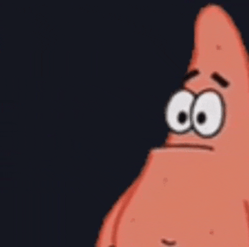 patrick star from spongebob squarepants is making a funny face and pointing his finger .