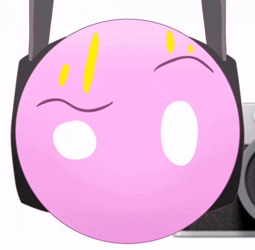 a pink smiley face with headphones on it