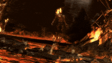 a man with flames coming out of his head stands in the middle of a fire