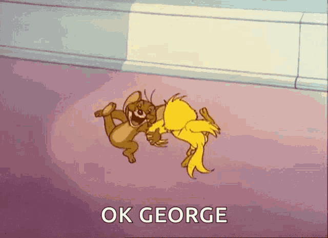tom and jerry are playing with each other on the floor and they are laughing .