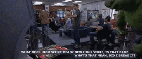 a group of people are playing a video game in a room with the words what does high score mean on the bottom