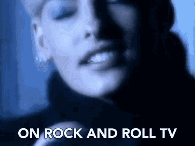 a close up of a woman 's face with the words `` on rock and roll tv '' written below her .