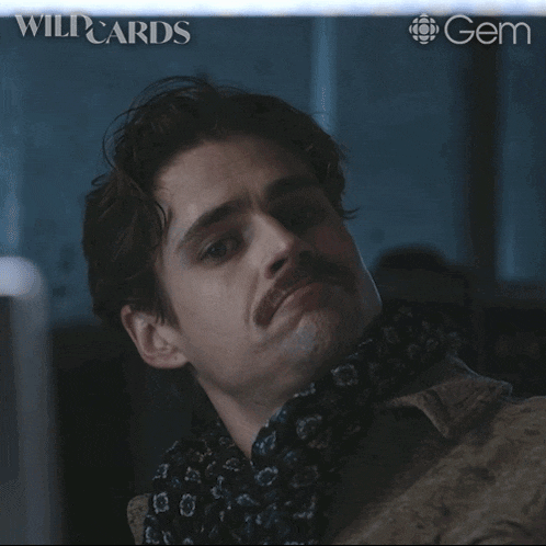 a man with a mustache has the words that was very convincing written on his face