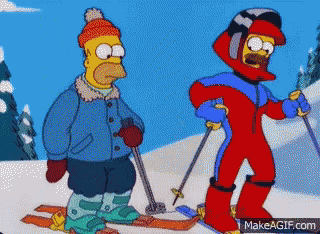 homer simpson and ned flanders from the simpsons are skiing in the snow
