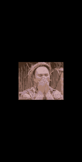 a man with a straw hat covering his face with his hands and the words " and thank youuu " written below him