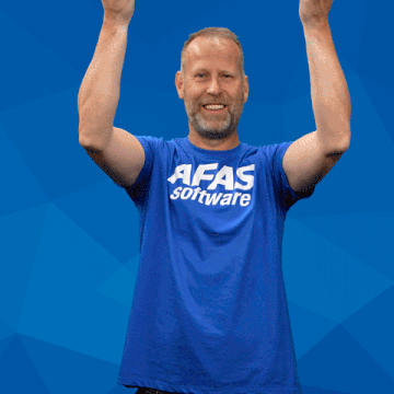 a man in a blue shirt is holding a sign that says exact
