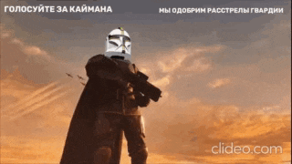 a man with a helmet on holding a gun in front of a cloudy sky