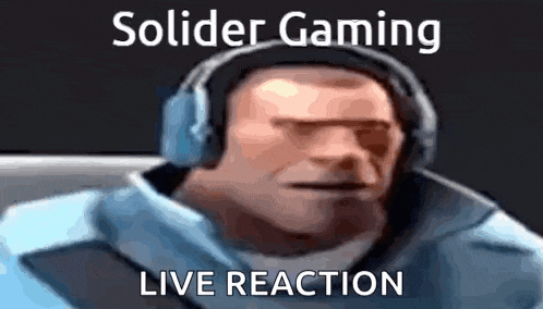 a man wearing headphones with the words `` solider gaming live reaction '' written on it .