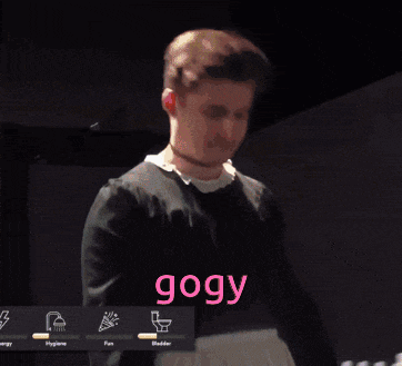 a man adjusts his hair with the word gogy in pink
