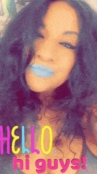 a woman with blue lipstick says hello hi guys on her face