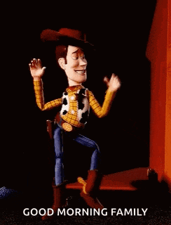 woody from toy story is standing in front of a door with his arms outstretched and says `` good morning family '' .