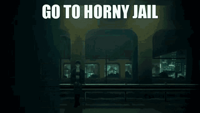a man is standing next to a woman in a dark room with the words `` go to horny jail '' written above him .