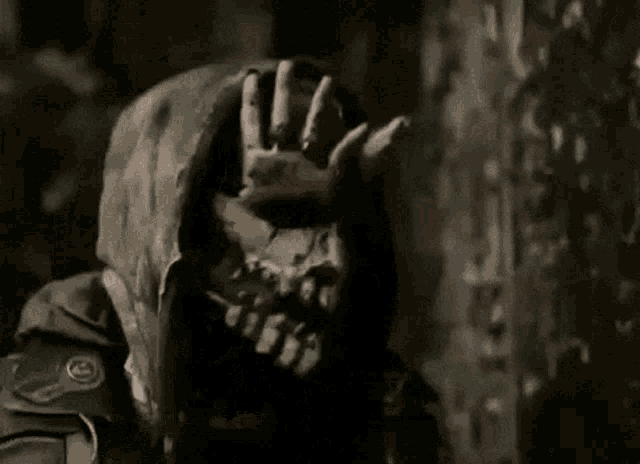 a close up of a person 's face with a skull on it .