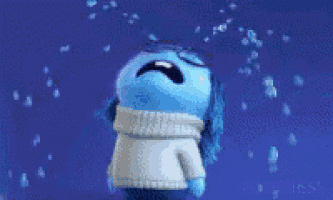 a blue cartoon character is crying with water coming out of his mouth .