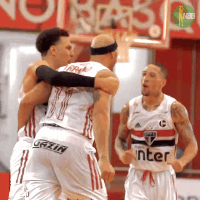 a group of basketball players with one wearing number 11