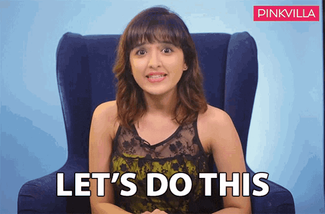 a woman sitting in a chair with the words let 's do this