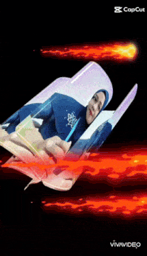 a woman in a hijab is flying through the air in a video made by capcut