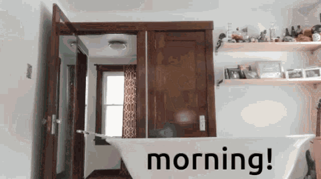 a bathtub in a bathroom with the words morning on the bottom