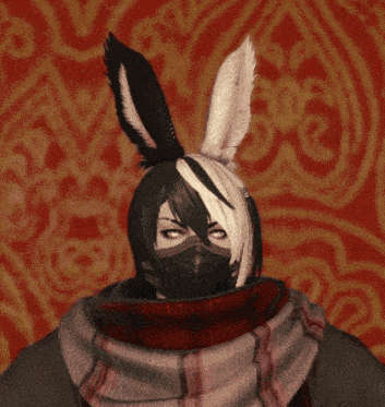 a person with black and white hair and bunny ears