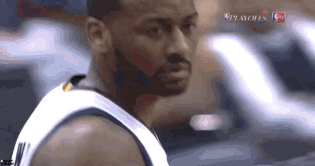 a close up of a basketball player with the nba playoffs written on the bottom right