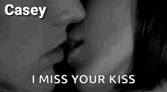 a black and white photo of a man and woman kissing with the words casey i miss your kiss below them