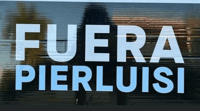 a sign that says fuera pierluisi in large white letters