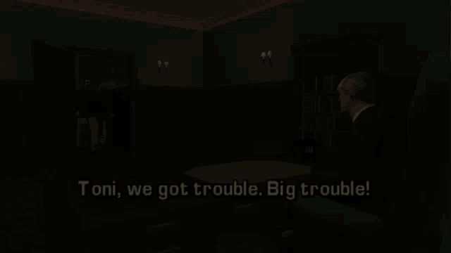 a video game scene with two men and the words toni we got trouble big trouble on the bottom