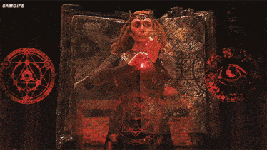 a woman in a red dress is surrounded by candles and a circle that says samgifs on it