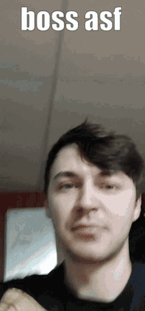 a man 's face is shown with the caption boss asf above it