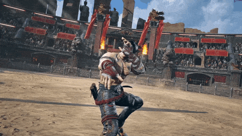 a man in a video game is holding a sword in his hand