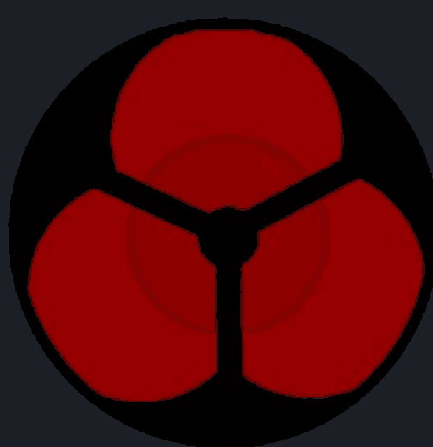 a close up of a red and black circle with three circles in the middle .